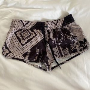 Never worn—Dark floral/funky pattern never worn O’Neil surf shorts